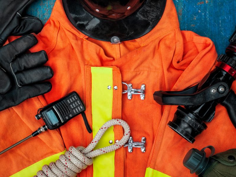 outfit-firefighter-old-table-background-fire-equipment-concept_small